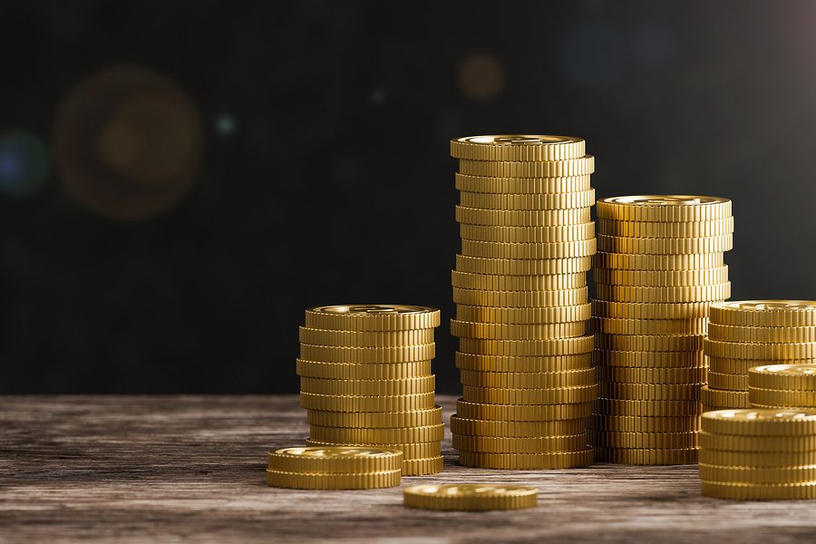 Stack of gold coins on black background. 3d render